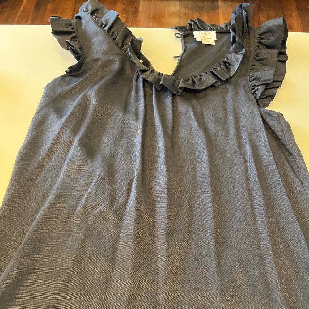 Black sleeveless silk blouse with ruffles